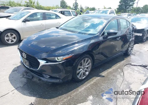 2021 Mazda Mazda3 Premium from USA, damaged, VIN JM1BPADL9M1305060